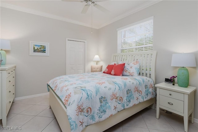 6659 Castlelawn Pl Unit 21, Naples, FL 34113 - bedroom featuring light tile patterned flooring, crown molding, a closet, baseboards, and ceiling fan