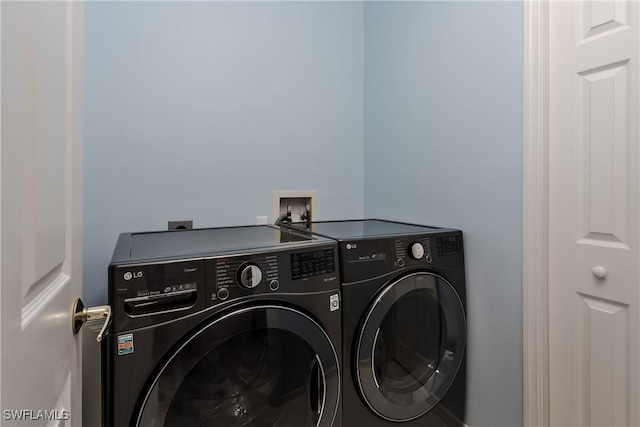 6659 Castlelawn Pl Unit 21, Naples, FL 34113 - laundry area with independent washer and dryer