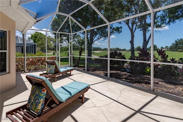 6659 Castlelawn Pl Unit 21, Naples, FL 34113 - sunroom featuring golf course view