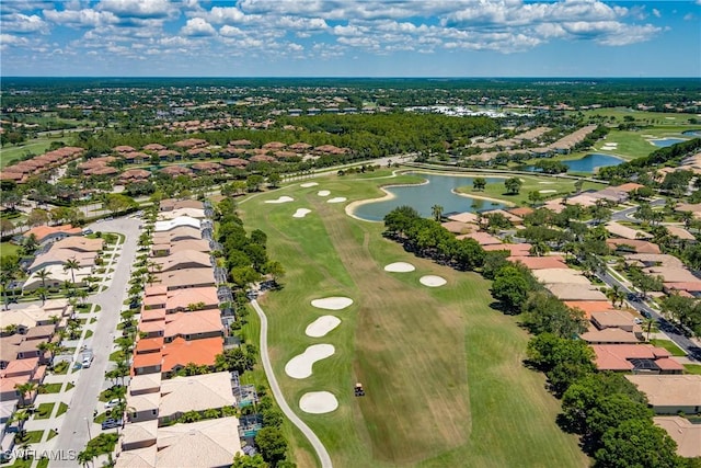 6659 Castlelawn Pl Unit 21, Naples, FL 34113 - aerial perspective of suburban area with a large body of water and a local golf course