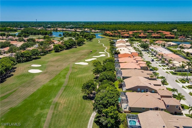 6659 Castlelawn Pl Unit 21, Naples, FL 34113 - aerial perspective of suburban area with a golf club and a large body of water
