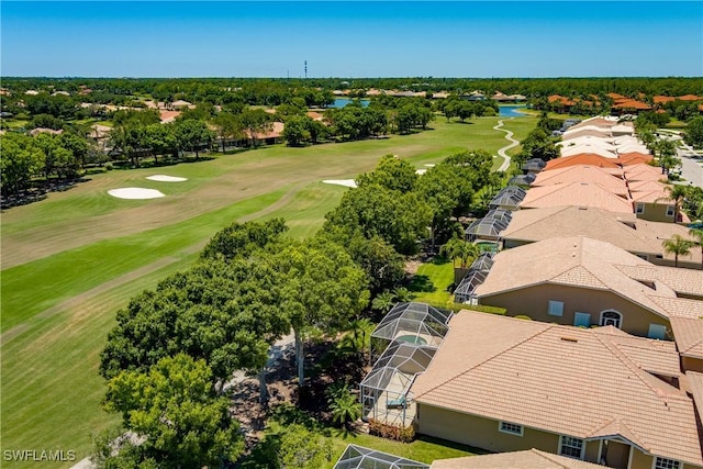 6659 Castlelawn Pl Unit 21, Naples, FL 34113 - aerial perspective of suburban area with a golf club, a large body of water, and a tree filled landscape