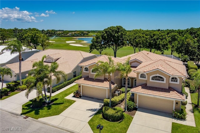 6659 Castlelawn Pl Unit 21, Naples, FL 34113 - aerial view of property and surrounding area with a local golf course and a nearby body of water