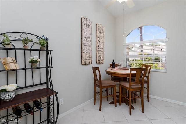 6659 Castlelawn Pl Unit 21, Naples, FL 34113 - dining room with baseboards, tile patterned flooring, and a ceiling fan