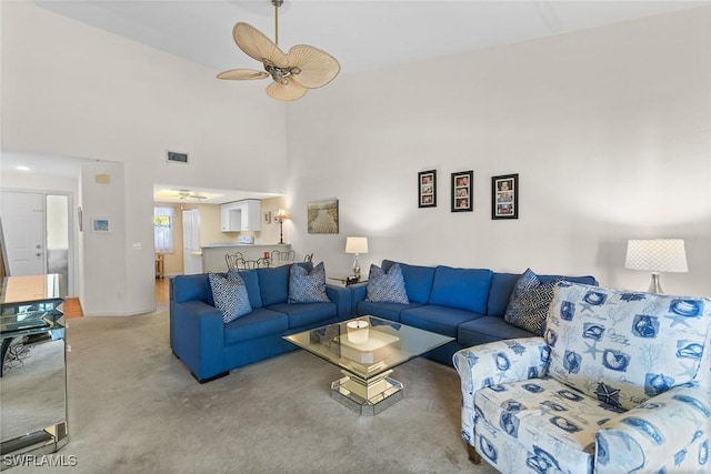 664 Wiggins Bay Dr, Naples, FL 34110 - carpeted living area with a ceiling fan