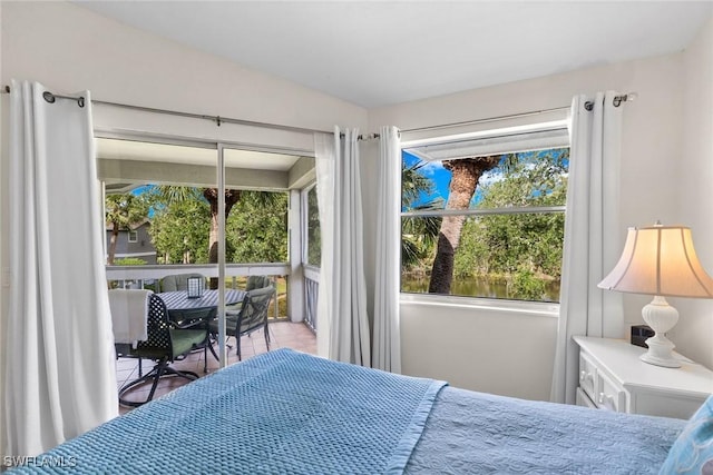 664 Wiggins Bay Dr, Naples, FL 34110 - bedroom featuring tile patterned flooring