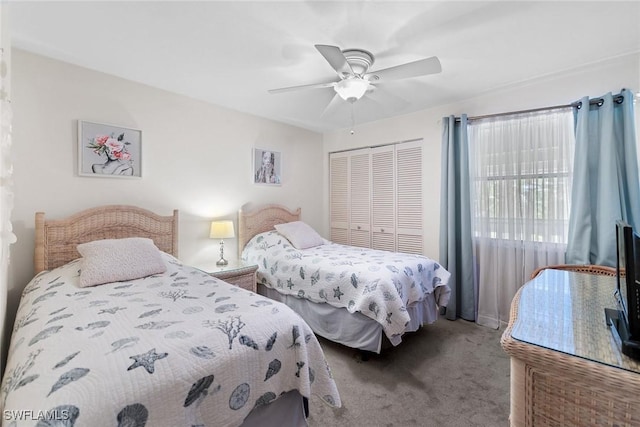 664 Wiggins Bay Dr, Naples, FL 34110 - carpeted bedroom with a closet and ceiling fan