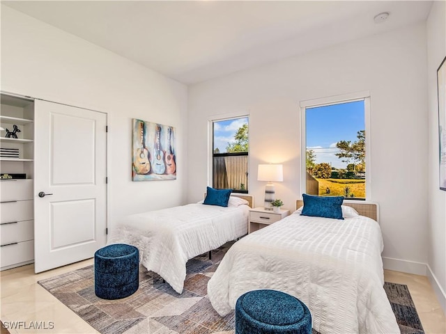 3922 NW 41st Ter, Cape Coral, FL 33993 - bedroom featuring baseboards