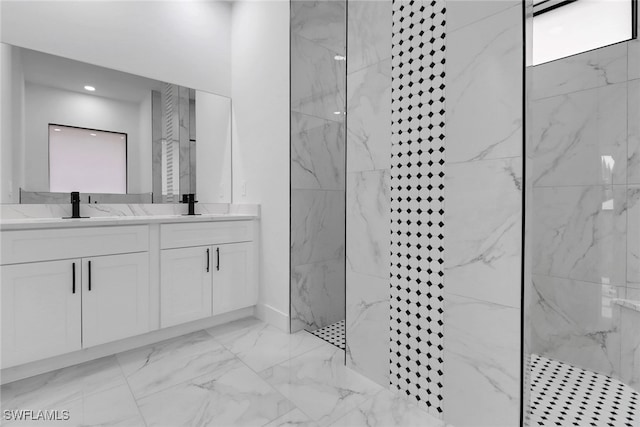 2712 58th St W, Lehigh Acres, FL 33971 - bathroom featuring a marble finish shower, marble look tile flooring, double vanity, and baseboards