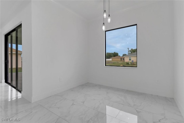 2712 58th St W, Lehigh Acres, FL 33971 - spare room with marble look tile flooring