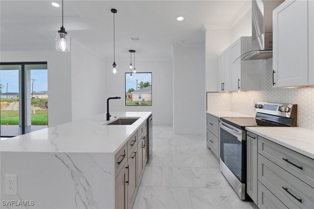 2712 58th St W, Lehigh Acres, FL 33971 - kitchen featuring stainless steel electric range, wall chimney exhaust hood, a sink, backsplash, and recessed lighting