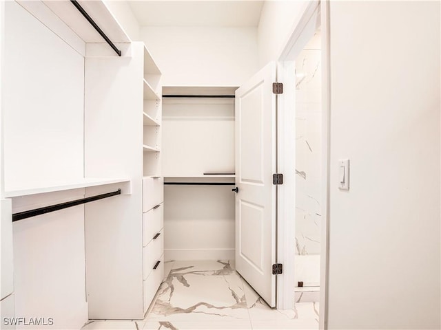 923 NE 17th St, Cape Coral, FL 33909 - walk in closet with light marble finish floors