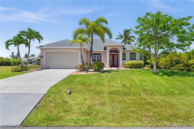 ranch-style house featuring french doors, stucco siding, a garage, a front lawn, and concrete driveway