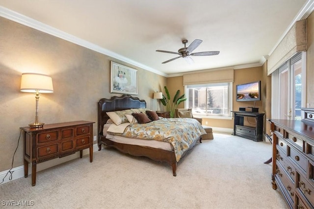 600 Port Side Dr, Naples, FL 34103 - bedroom with multiple windows, baseboards, light colored carpet, ornamental molding, and a ceiling fan