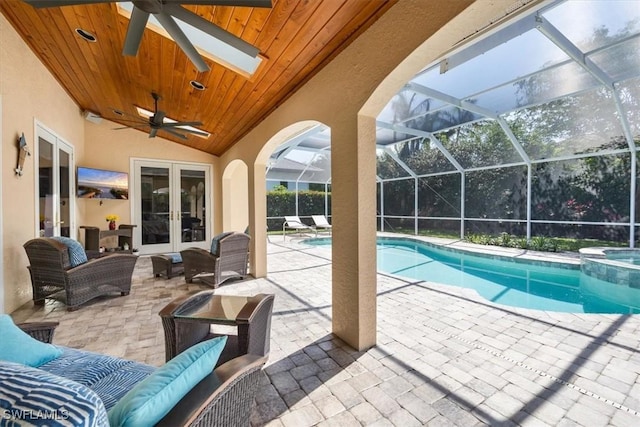 600 Port Side Dr, Naples, FL 34103 - view of pool with french doors, an outdoor hangout area, a pool with connected hot tub, a patio, and a ceiling fan