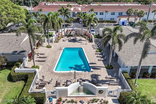 683 12th Ave S Unit 683, Naples, FL 34102 - view of swimming pool with fence