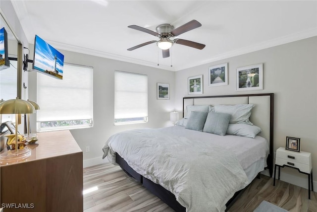 683 12th Ave S Unit 683, Naples, FL 34102 - bedroom with ornamental molding, wood finished floors, baseboards, and ceiling fan