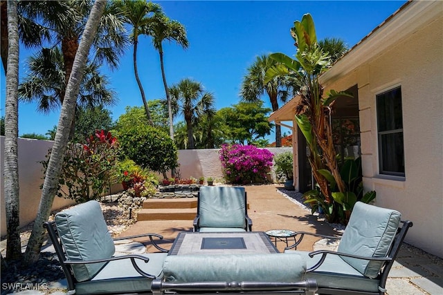2116 Paget Cir Unit 1, Naples, FL 34112 - view of patio with a fenced backyard