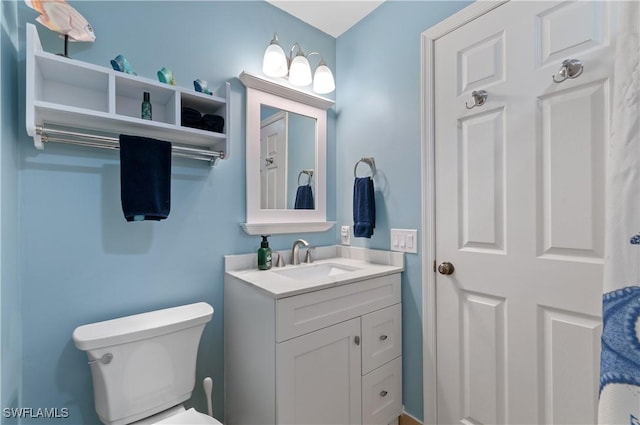 2116 Paget Cir Unit 1, Naples, FL 34112 - bathroom with toilet and vanity