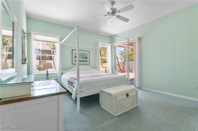2116 Paget Cir Unit 1, Naples, FL 34112 - carpeted bedroom featuring access to exterior, a ceiling fan, and baseboards