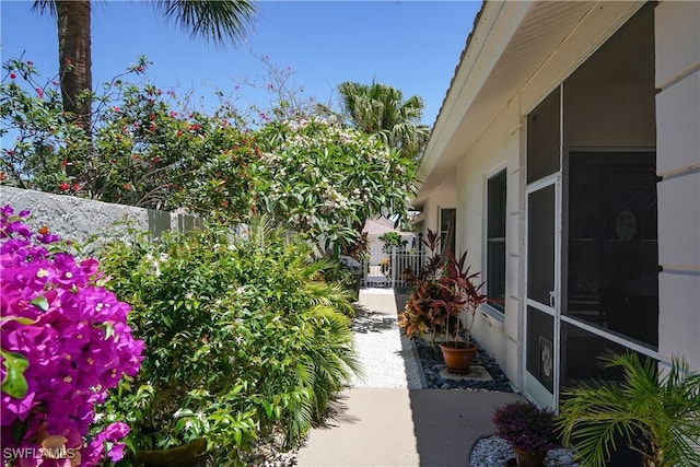 2116 Paget Cir Unit 1, Naples, FL 34112 - view of side of property with stucco siding