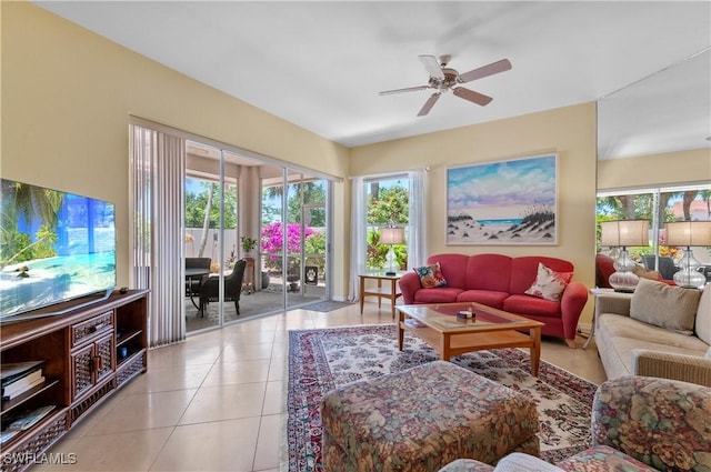2116 Paget Cir Unit 1, Naples, FL 34112 - living area with light tile patterned flooring and a ceiling fan