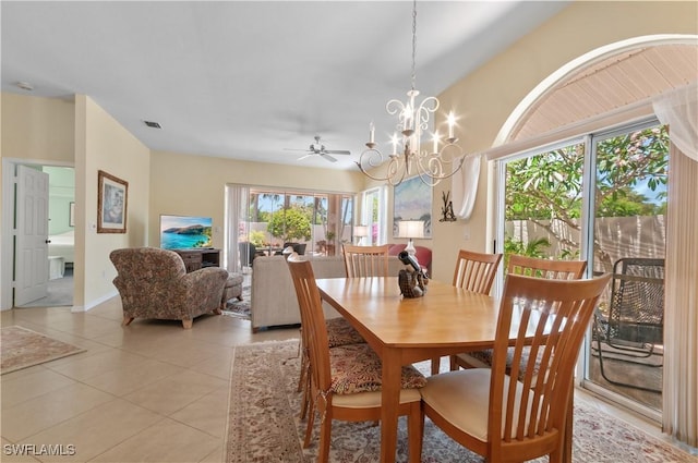 2116 Paget Cir Unit 1, Naples, FL 34112 - dining space featuring light tile patterned flooring and a chandelier