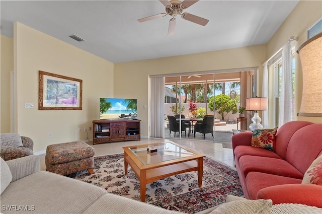 2116 Paget Cir Unit 1, Naples, FL 34112 - living area featuring a ceiling fan, tile patterned floors, and baseboards