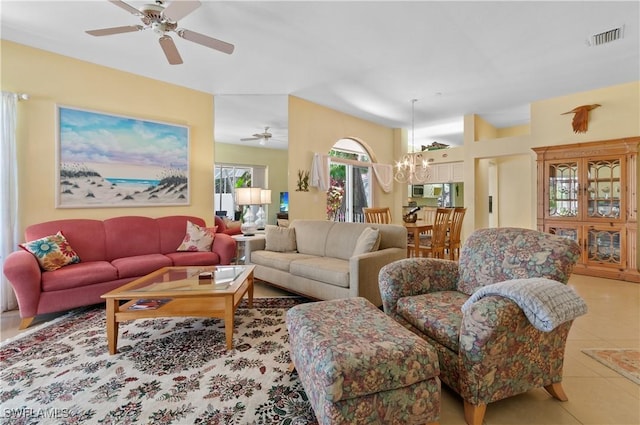 2116 Paget Cir Unit 1, Naples, FL 34112 - living room with a ceiling fan, a chandelier, and light tile patterned floors
