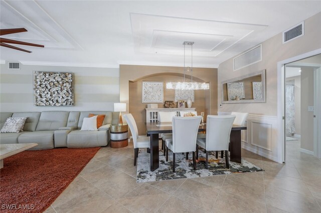 9469 Casoria Ct Unit 101, Naples, FL 34113 - tiled dining area with a raised ceiling and a ceiling fan