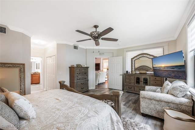 9469 Casoria Ct Unit 101, Naples, FL 34113 - bedroom with wood finished floors, crown molding, ensuite bath, a closet, and a ceiling fan