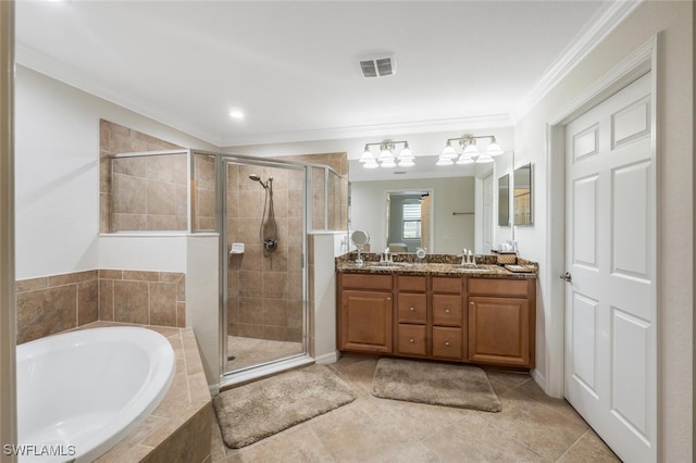 9469 Casoria Ct Unit 101, Naples, FL 34113 - full bath featuring double vanity, a garden tub, a shower stall, crown molding, and tile patterned flooring