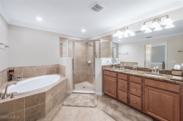 9469 Casoria Ct Unit 101, Naples, FL 34113 - bathroom with a garden tub, double vanity, a shower stall, ornamental molding, and tile patterned floors