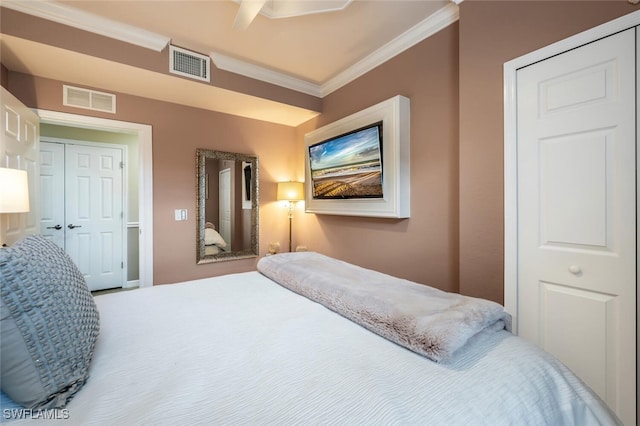 9469 Casoria Ct Unit 101, Naples, FL 34113 - bedroom with ornamental molding and a closet