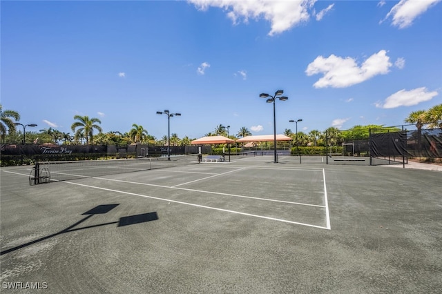 9469 Casoria Ct Unit 101, Naples, FL 34113 - view of tennis court with community basketball court