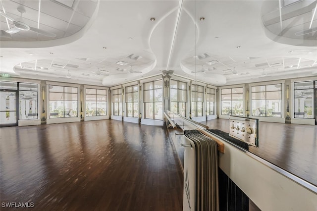 9469 Casoria Ct Unit 101, Naples, FL 34113 - hallway with wood finished floors