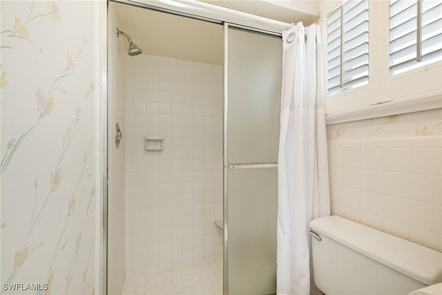 1466 Cumberland Ct, Fort Myers, FL 33919 - full bathroom with a shower stall, toilet, and tile walls