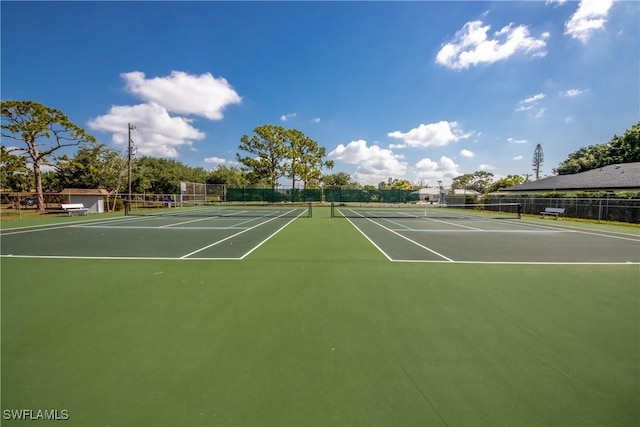 5905 Untermeyer Ct, North Fort Myers, FL 33903 - view of tennis court with community basketball court