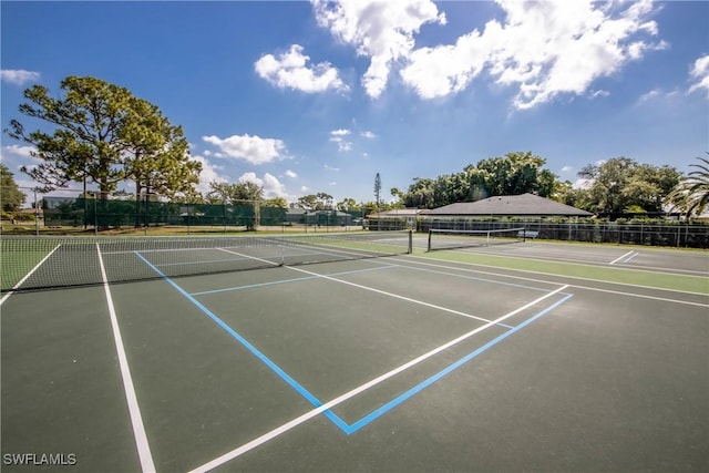 5905 Untermeyer Ct, North Fort Myers, FL 33903 - view of tennis court featuring community basketball court