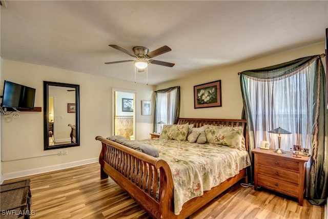 5905 Untermeyer Ct, North Fort Myers, FL 33903 - bedroom featuring light wood-type flooring, baseboards, and ceiling fan