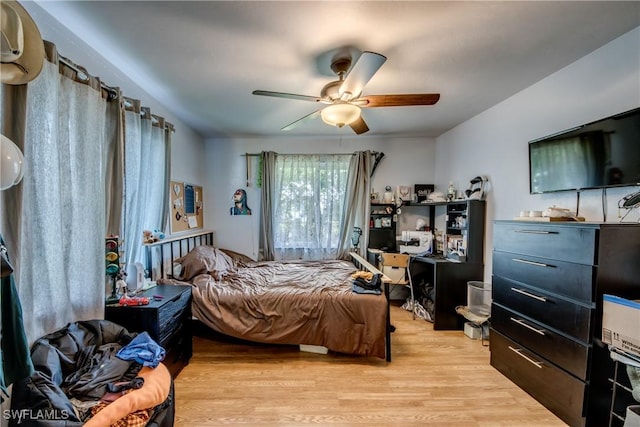5905 Untermeyer Ct, North Fort Myers, FL 33903 - bedroom featuring light wood-type flooring and a ceiling fan