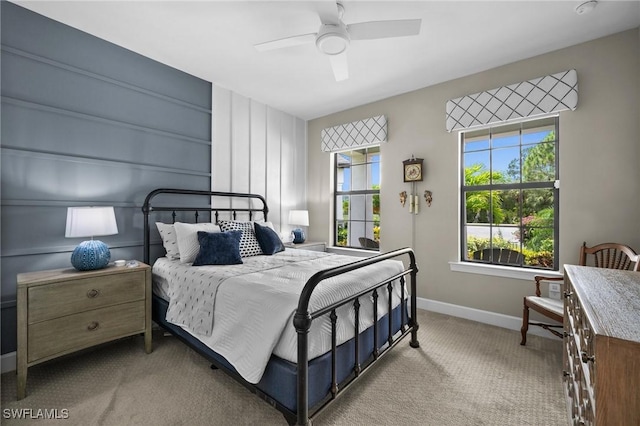 9284 Cormorant Dr, Naples, FL 34120 - carpeted bedroom featuring baseboards and ceiling fan