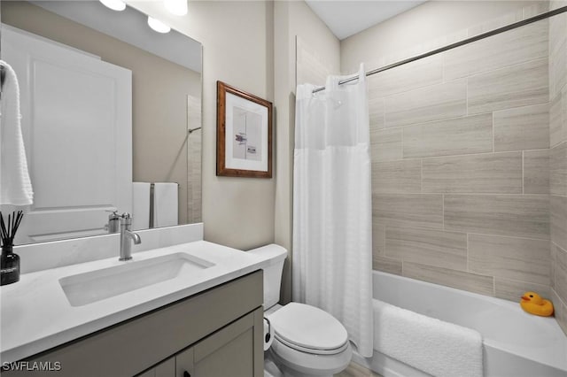 9284 Cormorant Dr, Naples, FL 34120 - full bathroom with vanity, shower / tub combo, and toilet