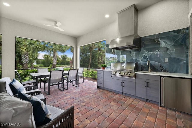 9284 Cormorant Dr, Naples, FL 34120 - view of patio / terrace featuring a sink, outdoor dining area, and ceiling fan
