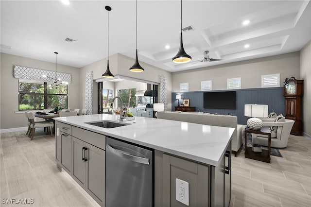 9284 Cormorant Dr, Naples, FL 34120 - kitchen featuring dishwasher, a sink, a center island with sink, a chandelier, and recessed lighting