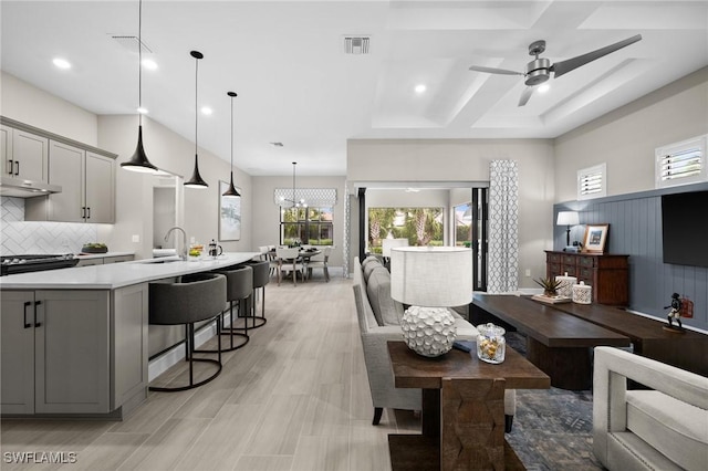 9284 Cormorant Dr, Naples, FL 34120 - living room with healthy amount of natural light, ceiling fan, and recessed lighting