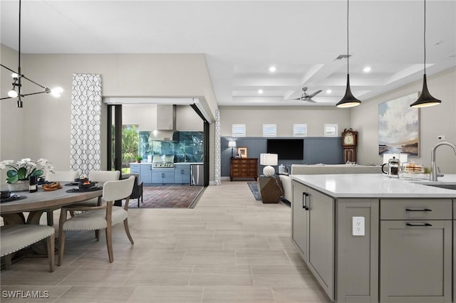 9284 Cormorant Dr, Naples, FL 34120 - kitchen featuring gray cabinets, recessed lighting, light countertops, decorative light fixtures, and open floor plan