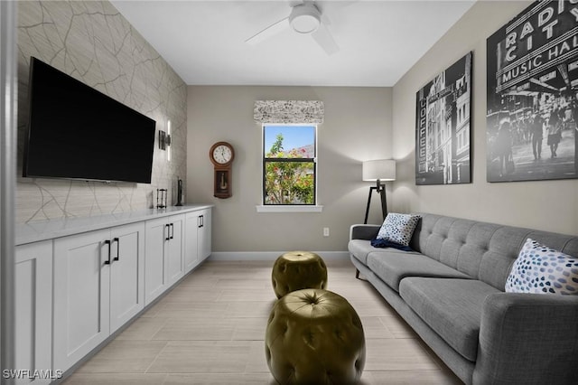 9284 Cormorant Dr, Naples, FL 34120 - living area featuring ceiling fan and baseboards