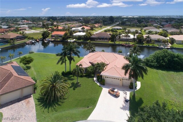 aerial perspective of suburban area featuring a large body of water