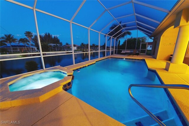 view of swimming pool featuring a water view, a patio, glass enclosure, and a pool with connected hot tub